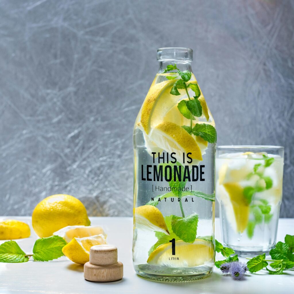 Lemon water drink prepared with fresh lemons for daily health benefits